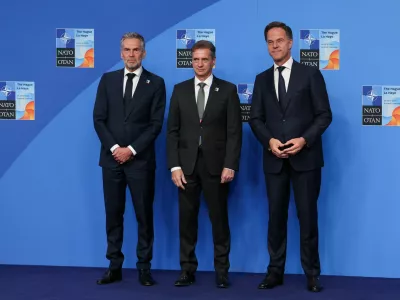 NATO Secretary General Mark Rutte and Dutch Prime Minister Dick Schoof welcome Slovenian Prime Minister Robert Golob at a NATO summit in The Hague, Netherlands June 25, 2025. REUTERS/Claudia Greco