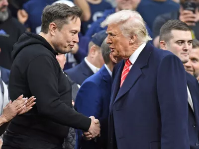 FILE PHOTO: Mar 22, 2025; Philadelphia, PA, USA; Elon Musk and President Donald Trump during the Division I Men's Wrestling Championship held at Wells Fargo Center. Mandatory Credit: Eric Hartline-Imagn Images/File Photo
