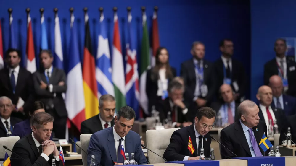 From left, Slovenia's Prime Minister Robert Golob, Spain's Prime Minister Pedro Sanchez, Sweden's Prime Minister Ulf Kristersson and Turkish President Recep Tayyip Erdogan attend a plenary session at the NATO summit in The Hague, Netherlands, Wednesday, June 25, 2025. (AP Photo/Matthias Schrader)