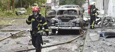 Firefighters work at the site of Russian air attack in Lviv, Ukraine, Saturday, July 12, 2025. (AP Photo/Mykola Tys)
