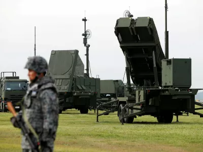 FILE PHOTO: A Japan Self-Defense Forces (JSDF) soldier takes part in a drill to mobilise their Patriot Advanced Capability-3 (PAC-3) missile unit at U.S. Air Force Yokota Air Base in Fussa on the outskirts of Tokyo, Japan August 29, 2017.  REUTERS/Issei Kato/File Photo
