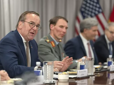 German Defense Minister Boris Pistorius, left, attends a meeting with Secretary of Defense Pete Hegseth, not pictured, at the Pentagon, Monday, July 14, 2025, in Washington. (AP Photo/Mark Schiefelbein)