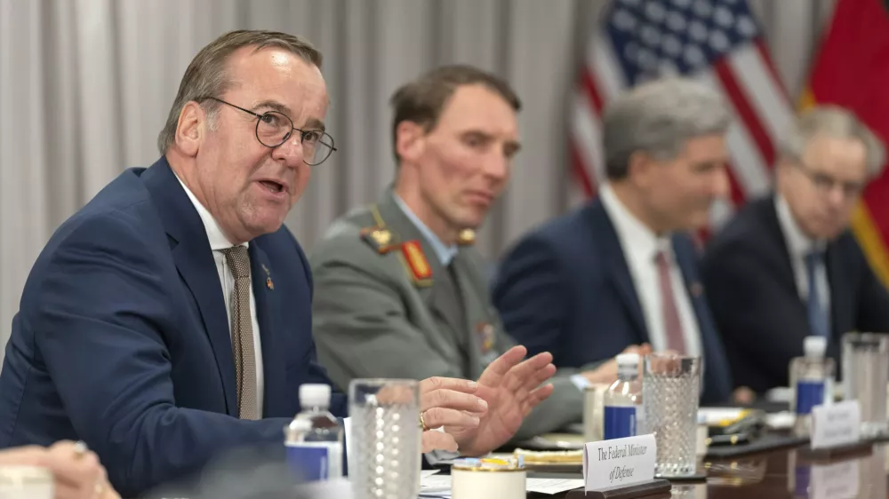 German Defense Minister Boris Pistorius, left, attends a meeting with Secretary of Defense Pete Hegseth, not pictured, at the Pentagon, Monday, July 14, 2025, in Washington. (AP Photo/Mark Schiefelbein)