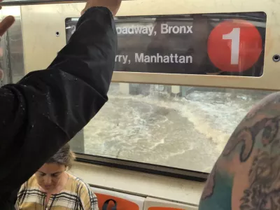 A man looks on from a subway as a station is flooded in New York, U.S., July 14, 2025, in this screengrab obtained from a social media video. Juan Luis Landaeta/via REUTERS THIS IMAGE HAS BEEN SUPPLIED BY A THIRD PARTY. MANDATORY CREDIT. NO RESALES. NO ARCHIVES.