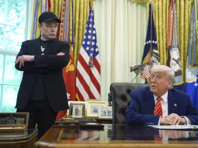 FILE - President Donald Trump, right, speaks during a news conference with Elon Musk in the Oval Office of the White House, in Washington, May 30, 2025,. (AP Photo/Evan Vucci, File)