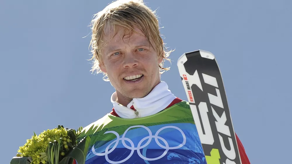 FILE - Audun Groenvold of Norway celebrates after taking third place in the men's skicross competition at the Vancouver 2010 Olympics in Vancouver, British Columbia, Sunday, Feb. 21, 2010. (AP Photo/Mark J. Terrill, File)