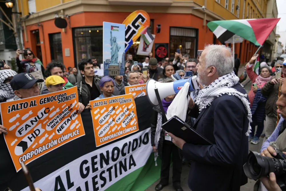 Supporters of Palestinians take part in a protest against Israel's military actions in Gaza, in Bogota, Colombia, Wednesday, July 16, 2025. (AP Photo/Fernando Vergara)