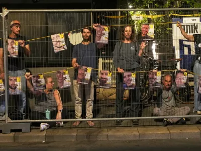 Families and supporters of Israeli hostages held by Hamas in Gaza, attend a protest calling for their release outside the prime minister's house in Jerusalem, Thursday, July. 17, 2025. (AP Photo/Ohad Zwigenberg)