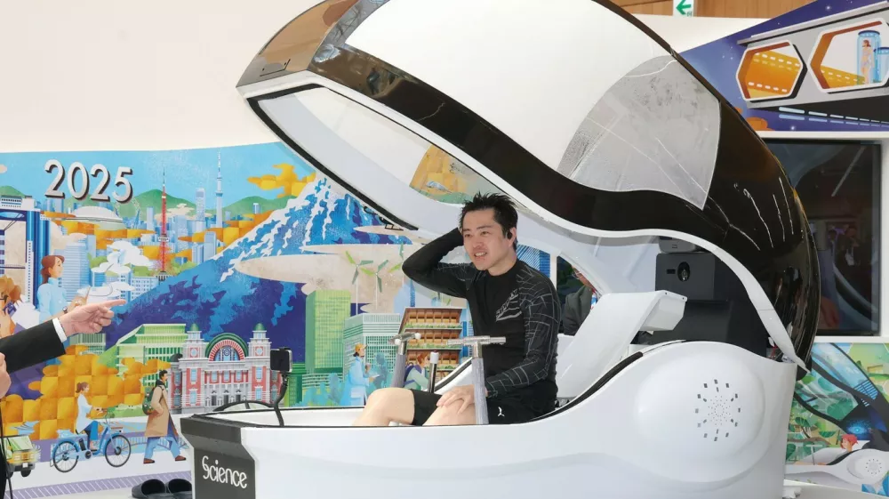Osaka Governor Hirofumi Yoshimura experiences the "Future Human Washing Machine" at the "Osaka Healthcare Pavilion" of the Osaka Expo in the city of Osaka, Sunday, March 23, 2025. A preview ceremony was held Sunday for the Osaka Healthcare Pavilion to be run by the prefecture and city of Osaka at the 2025 World Exposition, which begins next month in the western Japan city. (Jiji Press),Image: 978740935, License: Rights-managed, Restrictions: Only to be used in news reporting on the relevant subject, Model Release: no