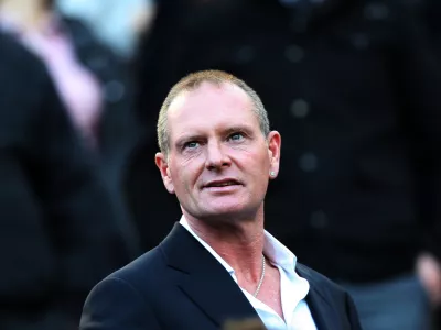 FILE - In this Sunday, Oct. 16, 2011 file photo, Paul Gascoigne, is seen in the stands ahead of the English Premier League soccer match between Newcastle United and Tottenham Hotspurs at St James' Park, Newcastle, England. Paul Gascoigne's appearance at a charity event, with his hands shaking uncontrollably and a stream of swear words tumbling out of his mouth, has sparked renewed fears about the health of one of England's most talented and popular footballers, with some are even saying his life is in danger. Gordon Taylor, chief executive of the Professional Footballer's Association, said Monday, Feb. 4, 2013, that "he sounds as if he needs almost a 24-hour watching brief at the moment." (AP Photo/Scott Heppell, File)