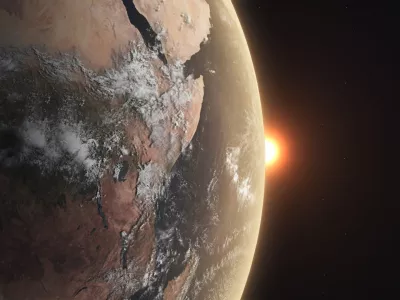 Realistic Earth with sunrise from spaceThe Earth maps used in the image are from following websitehttps://www.solarsystemscope.com/textures/