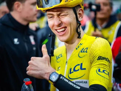 Zmagovalec dirke po Franciji Tadej Pogacar. / Foto: Anze Malovrh/sta