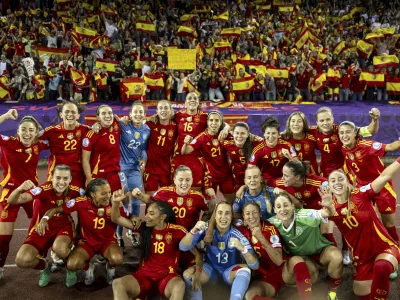 Spain's team cheers after winning the Women's Euro 2025 semifinal soccer match between Germany and Spain at the Letzigrund stadium in Zurich, Switzerland, Wednesday, July 23, 2025. (Michael Buholzer/Keystone via AP)