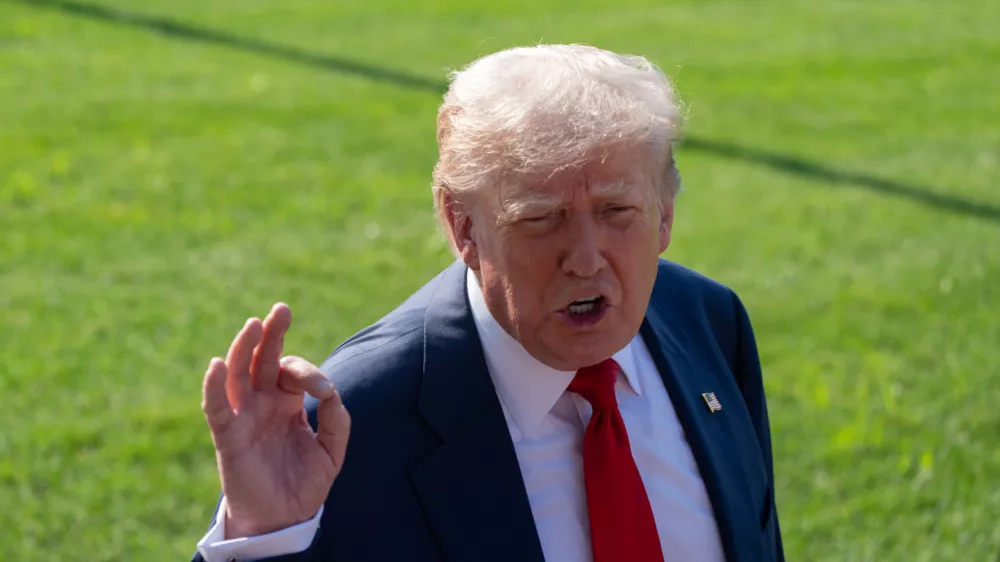 25 July 2025, US, Washington: US President Donald Trump speaks to the media before heading to Scotland this weekend for meetings and to play golf. Photo: Andrew Leyden/ZUMA Press Wire/dpa
