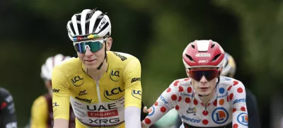 Cycling - Tour de France - Stage 20 - Nantua to Pontarlier - Pontarlier, France - July 26, 2025 UAE Team Emirates XRG's Tadej Pogacar and Team Visma | Lease a Bike's Jonas Vingegaard cross the finish line after stage 20 REUTERS/Benoit Tessier