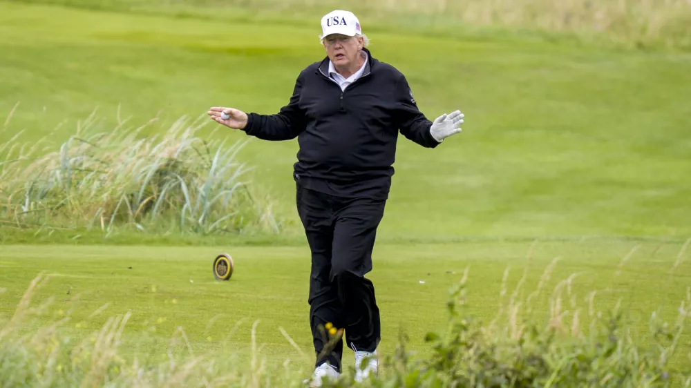 27 July 2025, United Kingdom, Turnberry: US President Donald Trump plays golf at his Trump Turnberry golf course in South Ayrshire, during his five-day private trip to the country. Photo: Jane Barlow/PA Wire/dpa