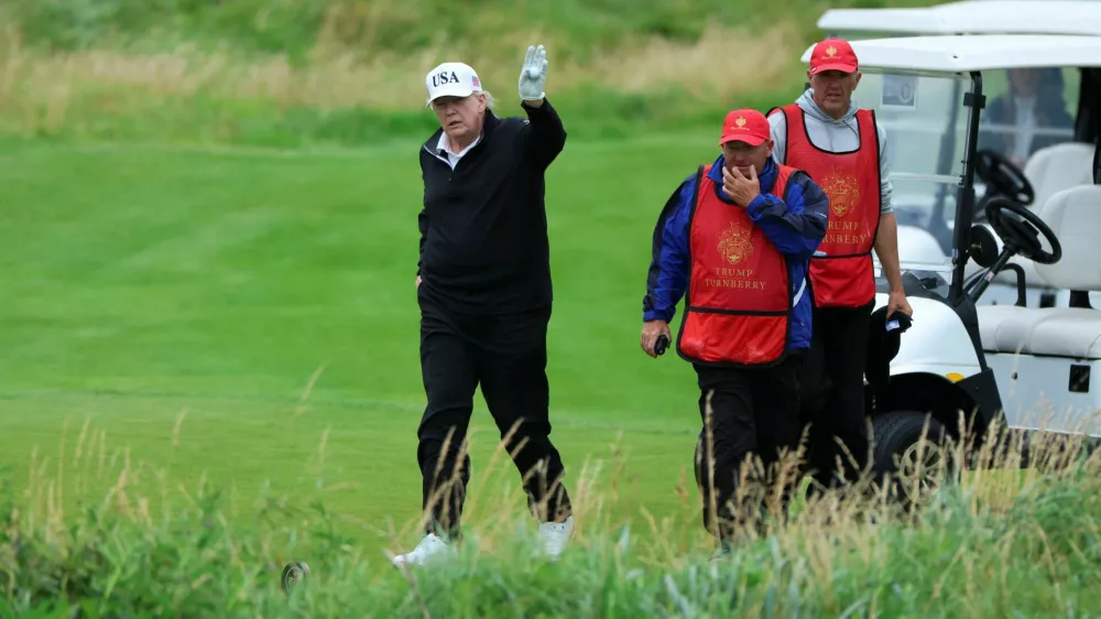 U.S. President Donald Trump holds a golf ball at Trump Turnberry resort in Turnberry, Scotland, Britain, July 27, 2025. REUTERS/Phil Noble