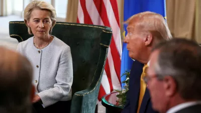 FILE PHOTO: European Commission President Ursula von der Leyen sits with U.S. President Donald Trump, after the announcement of a trade deal between the U.S. and EU, in Turnberry, Scotland, Britain, July 27, 2025. REUTERS/Evelyn Hockstein/File Photo