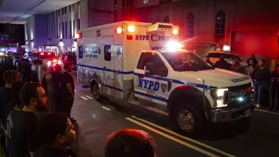 The ambulance carrying the body of Didarul Islam exits NewYork-Presbyterian/Weill Cornell Medical Hospital during the dignified transfer of the slain officer, who was shot and killed by a gunman earlier this evening, early Tuesday, July 29, 2025, in New York. (AP Photo/Angelina Katsanis)