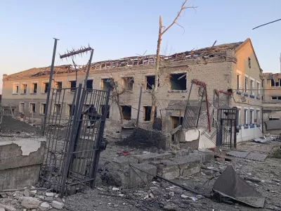 This photo provided by Ukraine's State Criminal Executive Service shows a damaged prison in the village of Bilenke in Ukraine's Zaporizhzhia region, following a Russian bomb attack that killed at least 17 inmates, on Tuesday, July 29, 2025. (Ukraine's State Criminal Executive Service via AP)