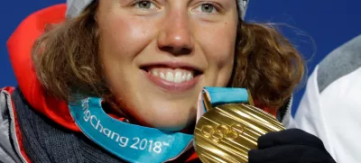 FILE PHOTO: Medals Ceremony - Biathlon - Pyeongchang 2018 Winter Olympics - Women's 10 km Pursuit - Medals Plaza - Pyeongchang, South Korea - February 13, 2018 - Gold medallist Laura Dahlmeier of Germany on the podium. REUTERS/Eric Gaillard/File Photo