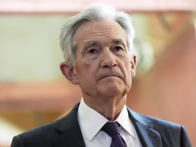 FILE - Federal Reserve Chairman Jerome Powell listens as President Donald Trump visits the Federal Reserve, Thursday, July 24, 2025, in Washington. (AP Photo/Julia Demaree Nikhinson, File)