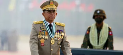 FILE PHOTO: Myanmar's junta chief Senior General Min Aung Hlaing, who ousted the elected government in a coup on February 1, 2021, presides over an army parade on Armed Forces Day in Naypyitaw, Myanmar, March 27, 2021. REUTERS/Stringer/File Photo