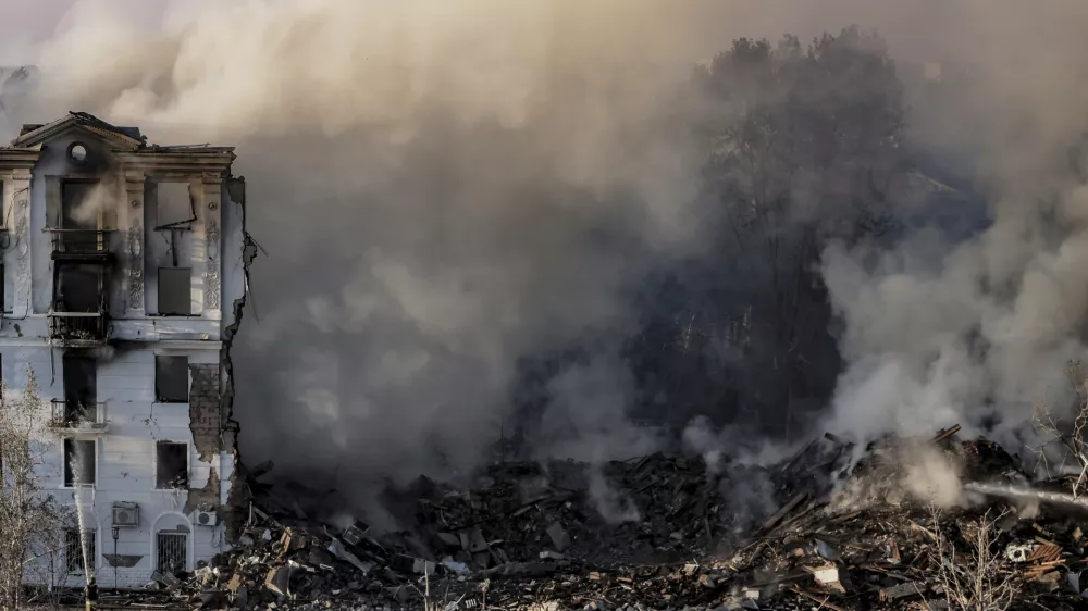 Smoke rises over a residential building destroyed by a Russian air strike on Kramatorsk, Ukraine, on Thursday, July 31, 2025. (AP Photo/Yevhen Titov)
