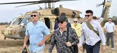 This handout photo from US Embassy Jerusalem shows White House special envoy Steve Witkoff, center, visiting a food distribution site run by the Gaza Humanitarian Foundation, a U.S.-backed organization approved by Israel, in the Gaza Strip Friday, Aug. 1, 2025. (David Azaguri/US Embassy Jerusalem via AP)