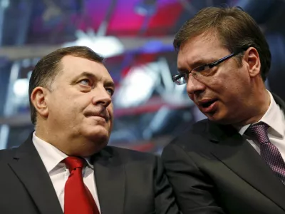 Milorad Dodik (L), president of the Republika Srpska, and Serbian Prime Minister Aleksandar Vucic attend the official celebration ceremony of Republika Srpska Statehood Day in Banja Luka, Bosnia and Herzegovina, January 9, 2015. Bosnian Serbs organised celebrations of the Statehood Day of their half of Bosnia despite the constitutional court's ruling to change the date for the holiday which was found to discriminate against other ethnic groups because it is also celebrated as an Orthodox holiday. REUTERS/Dado Ruvic - RTX21MM7