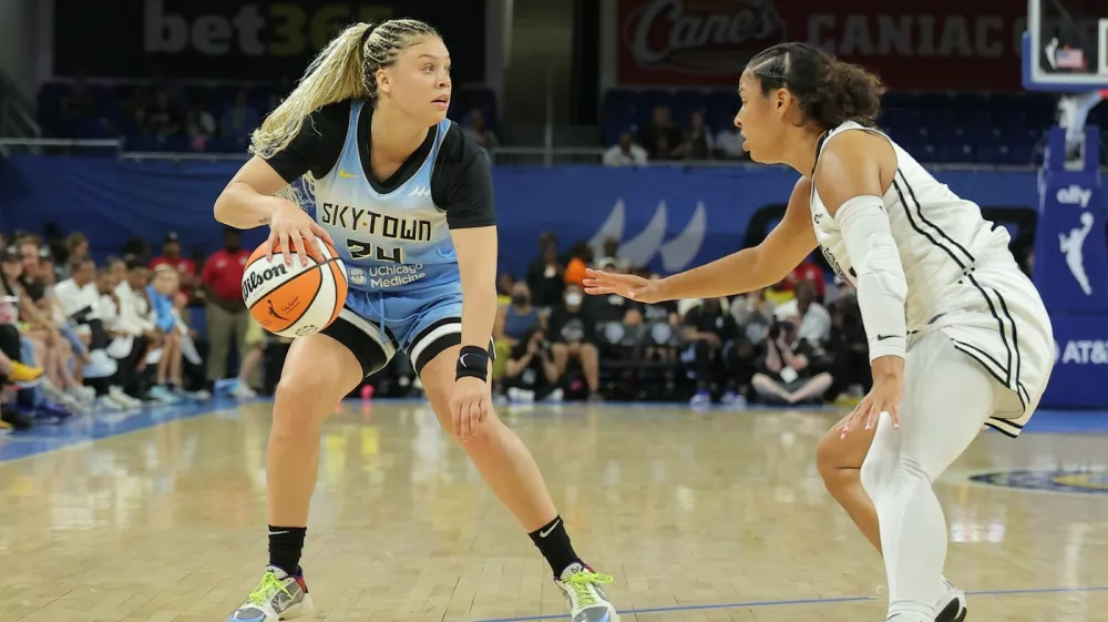 CHICAGO, IL - AUGUST 01: Veronica Burton #22 of the Golden State Valkyries guards Rachel Banham #24 of the Chicago Sky during the first half on August 1, 2025 at Wintrust Arena in Chicago, Illinois.,Image: 1027230216, License: Rights-managed, Restrictions:, Model Release: no