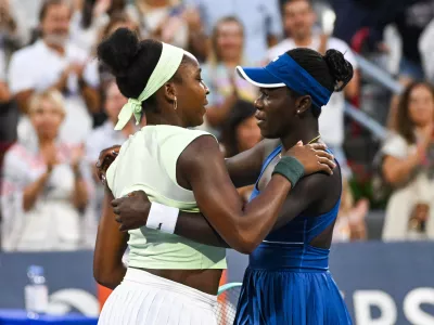 Aug 2, 2025; Montreal, QC, Canada; Coco Gauff (USA) congratulates Victoria Mboko (CAN) for her win in a fourth round match at IGA Stadium. Mandatory Credit: David Kirouac-Imagn Images