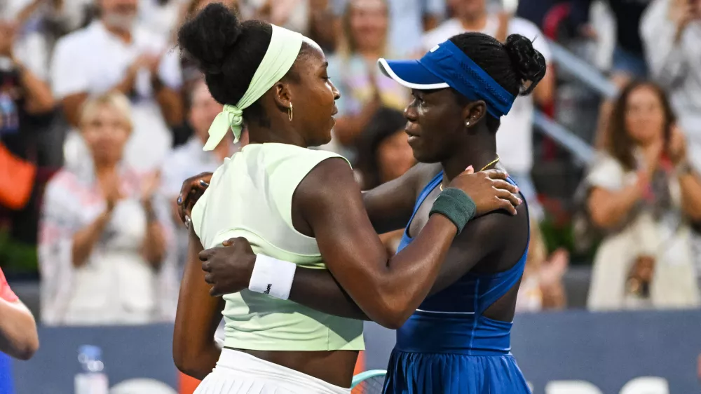 Aug 2, 2025; Montreal, QC, Canada; Coco Gauff (USA) congratulates Victoria Mboko (CAN) for her win in a fourth round match at IGA Stadium. Mandatory Credit: David Kirouac-Imagn Images