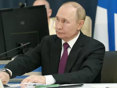 FILE PHOTO: Russian President Vladimir Putin takes part in a video link to observe major naval drills, which are conducted by the Russian Navy in the Pacific and Arctic oceans and in the Baltic and Caspian seas, during his visit to the Admiralty in Saint Petersburg, Russia, July 27, 2025. Sputnik/Alexei Danichev/Pool via REUTERS ATTENTION EDITORS - THIS IMAGE WAS PROVIDED BY A THIRD PARTY./File Photo