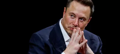FILE PHOTO: FILE PHOTO: Elon Musk, Chief Executive Officer of SpaceX and Tesla and owner of Twitter, gestures as he attends the Viva Technology conference dedicated to innovation and startups at the Porte de Versailles exhibition centre in Paris, France, June 16, 2023. REUTERS/Gonzalo Fuentes/File Photo/File Photo