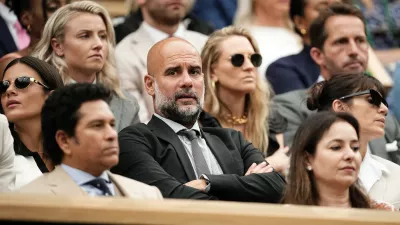 Pep Guardiola seated with his wife Cristina and his daughter Maria in the royal box on day six of the 2024 Wimbledon Championships at the All England Lawn Tennis and Croquet Club, London. Picture date: Saturday July 6, 2024.,Image: 887741026, License: Rights-managed, Restrictions: Editorial use only. No commercial use without prior written consent of the AELTC. Still image use only - no moving images to emulate broadcast. No superimposing or removal of sponsor/ad logos., Model Release: no