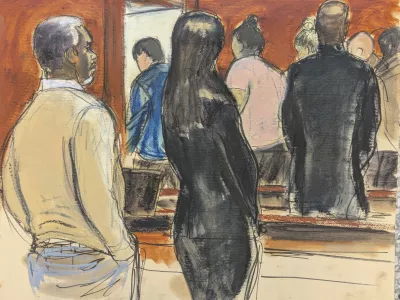 Sean 'Diddy' Combs, left, stands with his defense team, as he watches the jury file out after Judge Arun Subramanian instructed the jury to continue deliberations in Manhattan federal court, Tuesday, July 1, 2025, in New York. (Elizabeth Williams via AP)