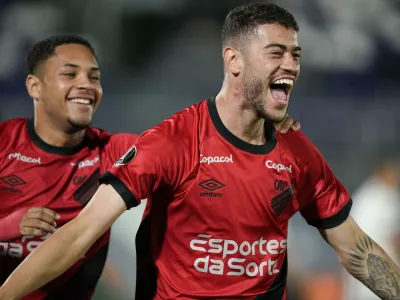 FILE - Rom&ucirc;lo of Brazil's Athletico Paranaense, right, celebrates scoring his side's opening goal against Paraguay's Libertad during a Copa Libertadores Group G soccer match at Defensores del Chaco stadium in Asuncion, Paraguay, Thursday, May 4, 2023. (AP Photo/Jorge Saenz, file)