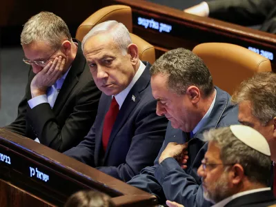 FILE PHOTO: Israeli Prime Minister Benjamin Netanyahu attends a discussion at the plenum in the Knesset, Israel's parliament, in Jerusalem, July 23, 2025. REUTERS/Ronen Zvulun/File Photo