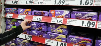 GERMANY - FEBRUARY 2015: Shelves with a variety of Milka chocolate bars in a Kaufland supermarket. Milka is a traditional Swiss brand of chocolate confection, since 1990 manufactured by US-american Mondelēz International,Image: 228895946, License: Rights-managed, Restrictions: Usage restrictions: Advertising and promotion,Commercial electronic,Consumer goods,Direct mail and brochures,Indoor display,Internal business usage,Personal use, Model Release: no