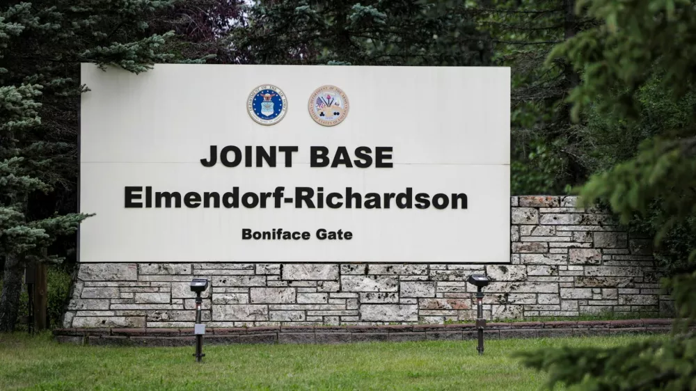 A sign sits at Joint Base Elmendorf-Richardson is seen ahead of a planned meeting between U.S. President Donald Trump and Russian President Vladimir Putin to discuss the war in Ukraine, in Anchorage, Alaska, U.S., August 13, 2025. REUTERS/Jeenah Moon