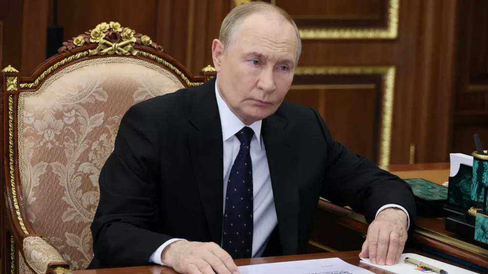 Russian President Vladimir Putin attends a meeting with head of the Federal Taxation Service Daniil Yegorov at the Kremlin in Moscow, Russia August 13, 2025. Sputnik/Vyacheslav Prokofyev/Pool via REUTERS ATTENTION EDITORS - THIS IMAGE WAS PROVIDED BY A THIRD PARTY.