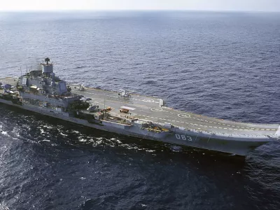 FILE - In this 2004 file photo the Admiral Kuznetsov carrier seen in the Barents Sea, Russia. The Russian military says one of its the MiG-29 fighter jets based at a Russian aircraft carrier currently near Syria's shores has crashed on a training mission, but its pilot has survived. (AP Photo, File)