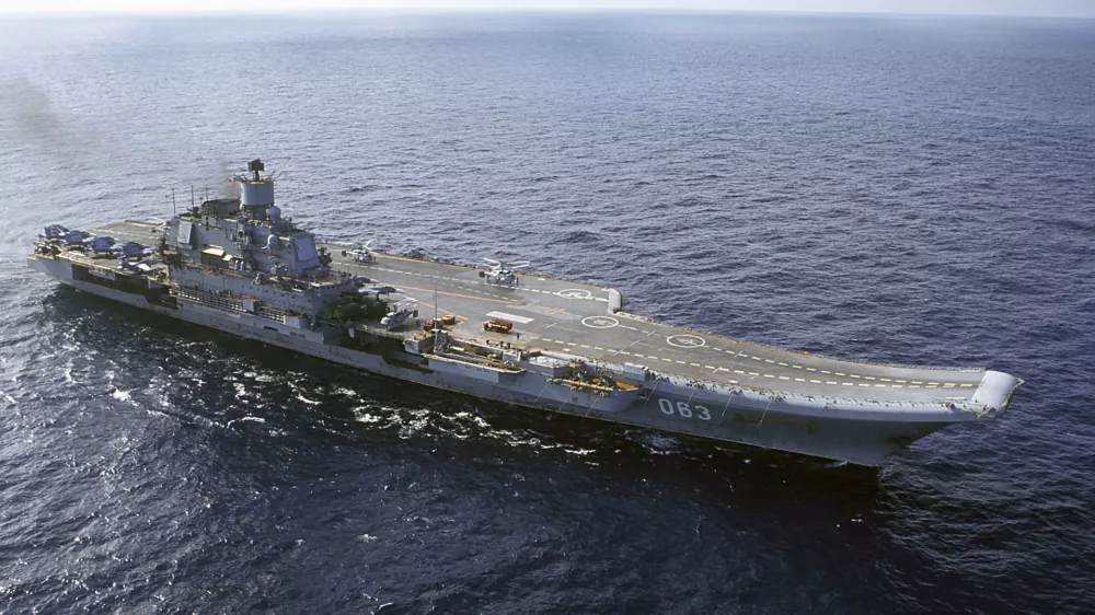 FILE - In this 2004 file photo the Admiral Kuznetsov carrier seen in the Barents Sea, Russia. The Russian military says one of its the MiG-29 fighter jets based at a Russian aircraft carrier currently near Syria's shores has crashed on a training mission, but its pilot has survived. (AP Photo, File)