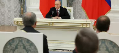 Russia's President Vladimir Putin addresses senior officials following a meeting with U.S. President Donald Trump, at the Kremlin in Moscow, Russia, August 16, 2025. Sputnik/Vyacheslav Prokofyev/Pool via REUTERS ATTENTION EDITORS - THIS IMAGE WAS PROVIDED BY A THIRD PARTY.