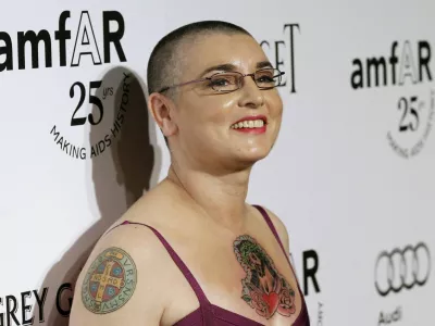 Irish singer and songwriter Sinead O'Connor poses at the amfAR's Inspiration LA Gala in Hollywood, California in this October 27, 2011 file photo. O'Connor has ended her fourth marriage after just 16 days, blaming pressure and disapproval from the family and friends of her new husband Barry Herridge. The 46-year-old Irish singer said on her blog that the marriage went wrong three hours after the December 8, 2011 ceremony in Las Vegas and that the pair had lived together for only seven days before splitting on Christmas Eve. REUTERS/Mario Anzuoni/Files (UNITED STATES - Tags: ENTERTAINMENT)
