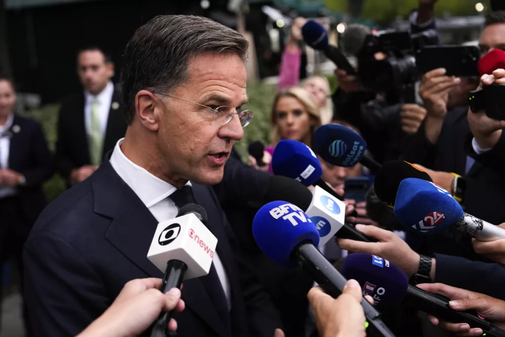 NATO Secretary General Mark Rutte speaks with reporters at the White House, Monday, Aug. 18, 2025, in Washington. (AP Photo/Julia Demaree Nikhinson)