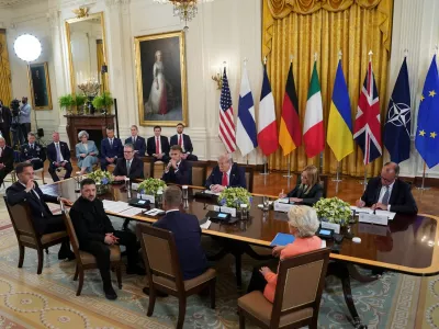 Ukrainian President Volodymyr Zelenskiy speaks during a meeting with U.S. President Donald Trump, German Chancellor Friedrich Merz, French President Emmanuel Macron, British Prime Minister Keir Starmer, Italian Prime Minister Giorgia Meloni, Finland's President Alexander Stubb, NATO Secretary General Mark Rutte and European Commission President Ursula von der Leyen amid negotiations to end the Russian war in Ukraine, at the White House in Washington, D.C., U.S., August 18, 2025. REUTERS/Alexander Drago