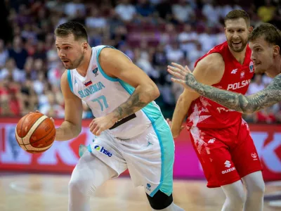 Basketball - FIBA EuroBasket 2025 - Group Phase - Slovenia v Poland - Spodek, Katowice, Poland - August 28, 2025 Slovenia's Luka Doncic in action Grzegorz Celejewski/Agencja Wyborcza.pl via REUTERS ATTENTION EDITORS - THIS IMAGE WAS PROVIDED BY A THIRD PARTY. POLAND OUT. NO COMMERCIAL OR EDITORIAL SALES IN POLAND.