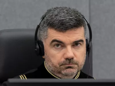 Judge Nicolas Guillou opens the court session for Veseli's initial appearance at the Kosovo Specialist Chambers in The Hague, Netherlands November 10, 2020. Peter Dejong/Pool via REUTERS